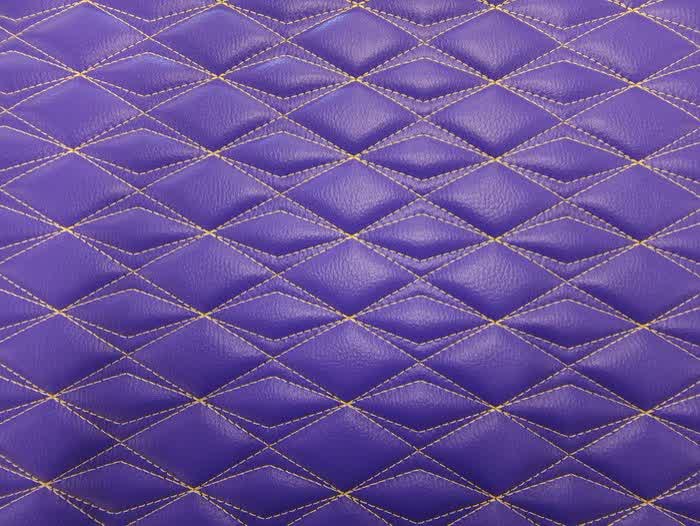 Diamond stitch pattern on purple vinyl with gold thread