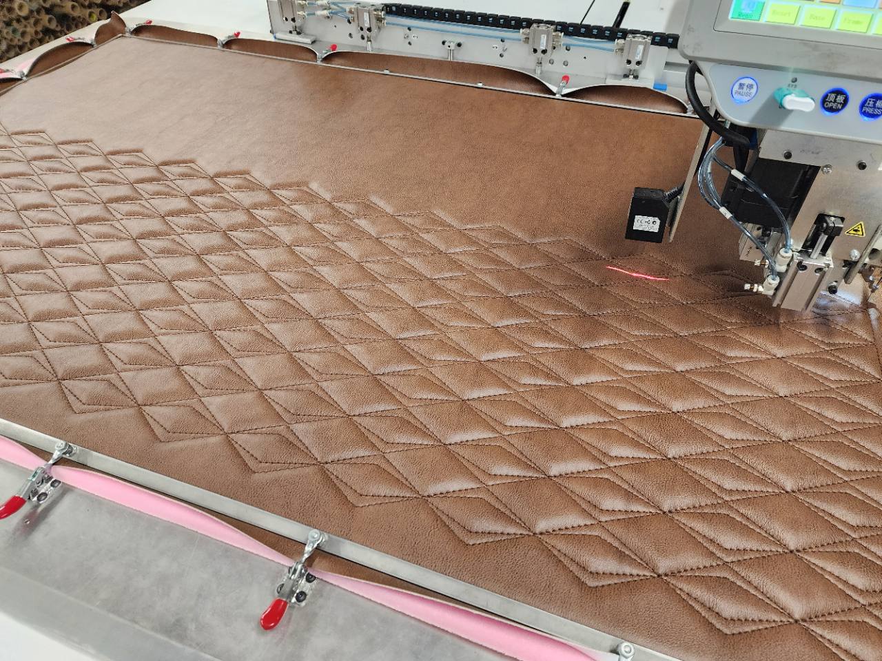 Diamond in Diamond upholstery panel being CNC sewn in High Point, North Carolina