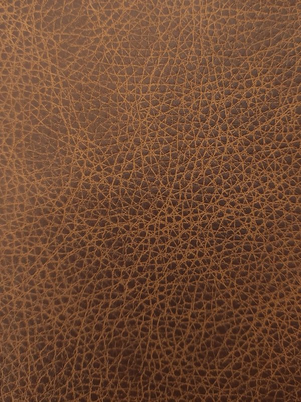 Roadhouse leather in Cognac — material reference; sample deck contains all 14 colors. Physical deck not pictured.