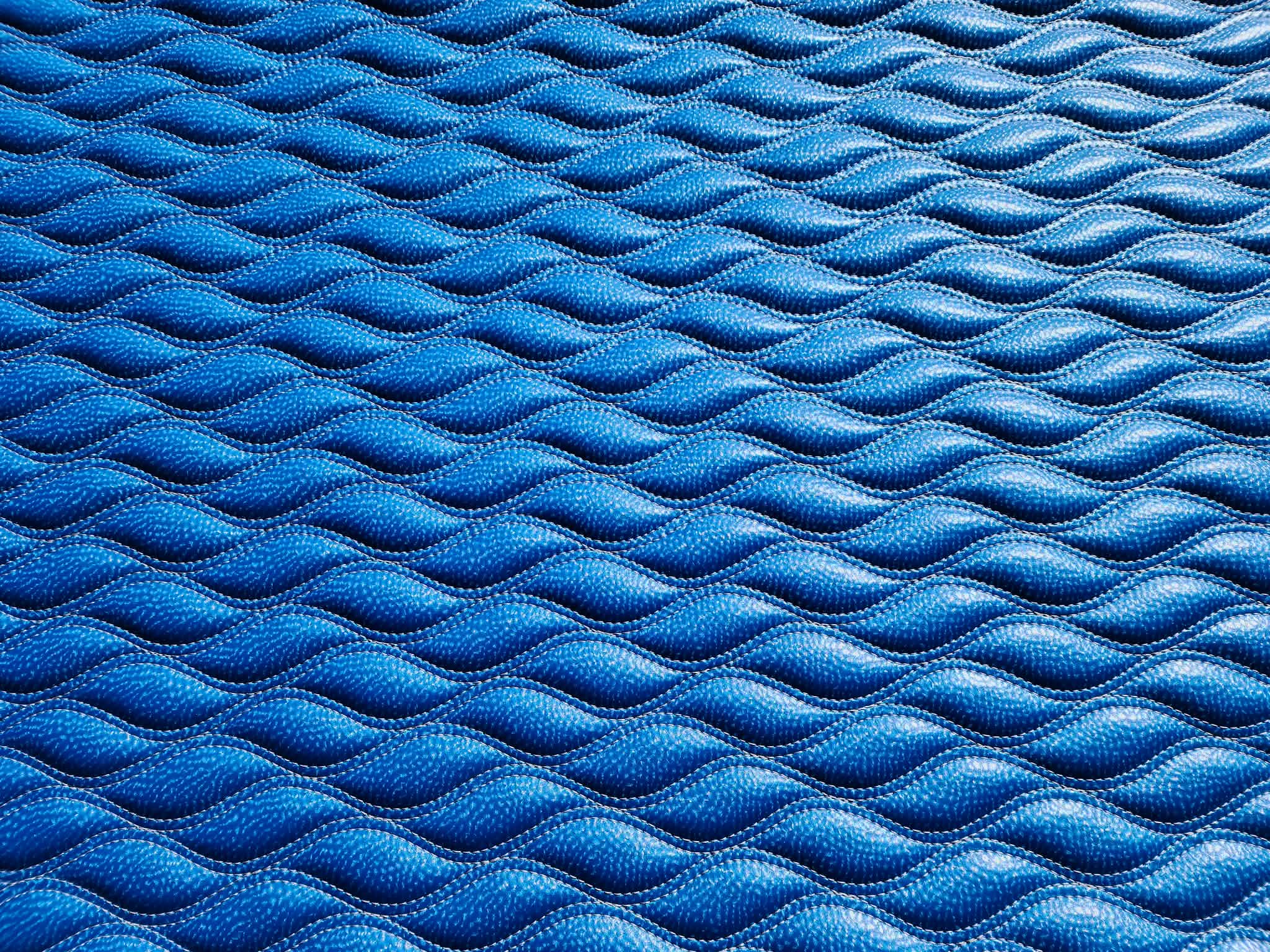 Hydrowave CNC sewn panel in metallic blue vinyl with grey stitching