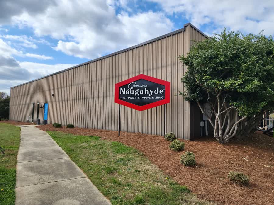 Original Naugahyde sign at Carolyn Fabrics - authorized vendor since 1932